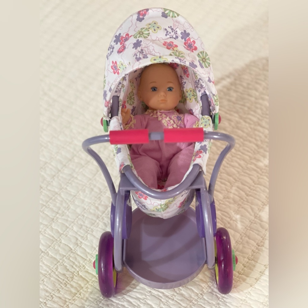 American girl baby Polly with stroller